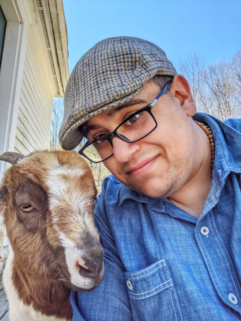 Me (Tony) hanging out with our newest rescue goat, Korra. The wonders of being a farmer. 